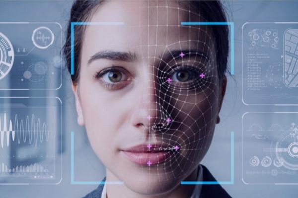 This futuristic image shows the face of a young woman as it is being assessed through data and biometric analysis.